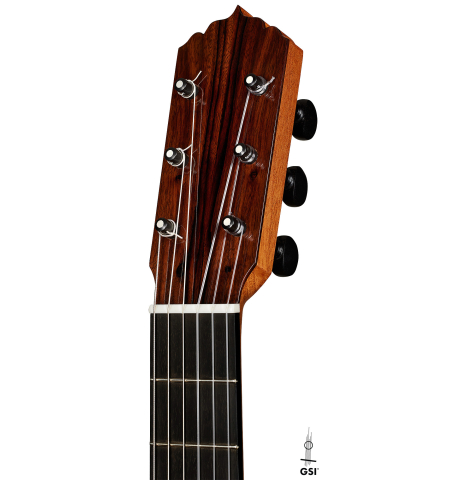 The headstock of a 2024 Andy Culpepper w/pegs flamenco guitar made of cedar and cypress