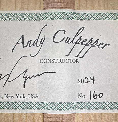 The label of a 2024 Andy Culpepper w/pegs flamenco guitar made of cedar and cypress
