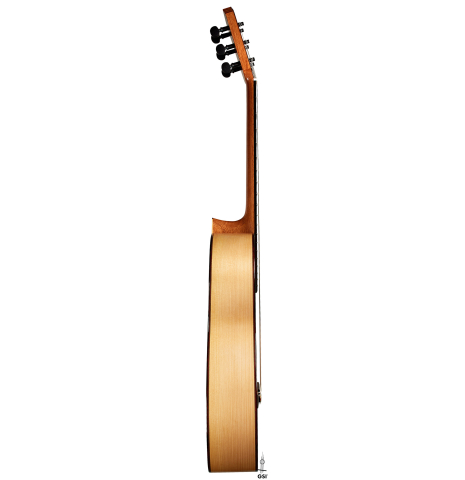 The side of a 2024 Andy Culpepper w/pegs flamenco guitar made of cedar and cypress