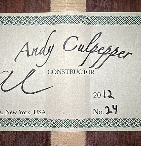 The label of a 2012 Andy Culpepper "Coral" flamenco guitar made of spruce and padauk