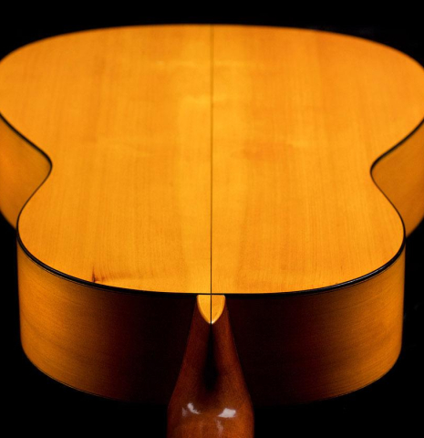The back of a 1966 Manuel de la Chica flamenco guitar made of spruce and cypress