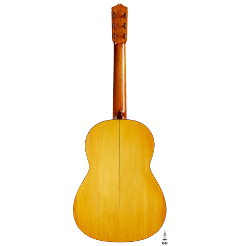 The back of a 1957 Manuel de la Chica flamenco guitar with pegs made of spruce and cypress