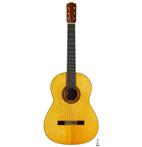 The front of a 1957 Manuel de la Chica flamenco guitar with pegs made of spruce and cypress