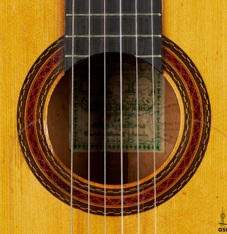 The rosette of a 1957 Manuel de la Chica flamenco guitar with pegs made of spruce and cypress