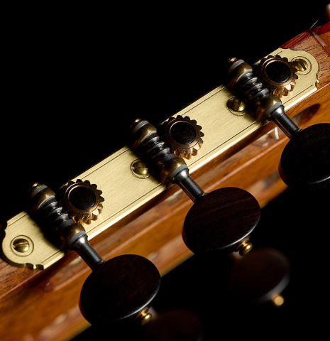 The tuning machines of a 1961 Manuel de la Chica flamenco blanca guitar made of spruce and cypress