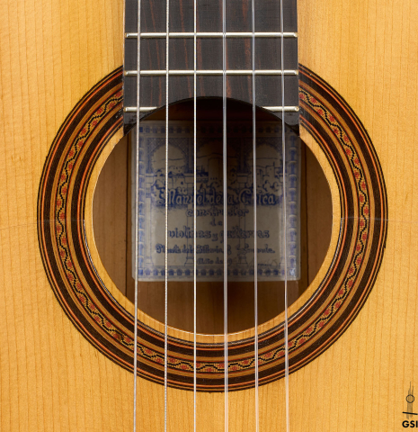 The rosette of a 1961 Manuel de la Chica flamenco blanca guitar made of spruce and cypress