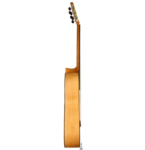 The side of a 1961 Manuel de la Chica flamenco blanca guitar made of spruce and cypress