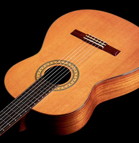 The front of a 1997 Lester DeVoe &quot;Negra&quot; flamenco guitar made of cedar and Indian rosewood