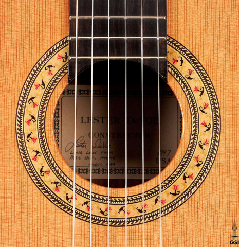 The rosette of a 1997 Lester DeVoe &quot;Negra&quot; flamenco guitar made of cedar and Indian rosewood