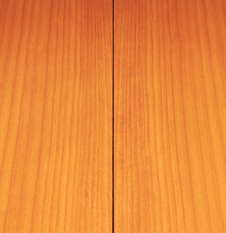 The back of a 1985 Lester DeVoe flamenco guitar made with spruce and cypress.