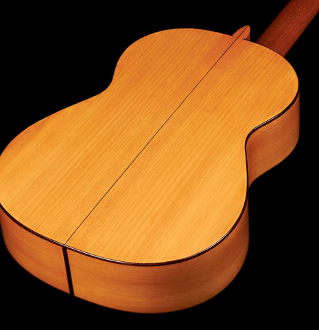 The back of a 1985 Lester DeVoe flamenco guitar made with spruce and cypress.