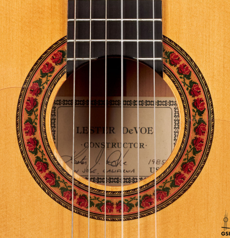 The rosette of a 1985 Lester DeVoe flamenco guitar made with spruce and cypress.