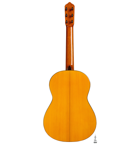The back of a 2012 Lester DeVoe w/pegs flamenco guitar made of spruce and cypress