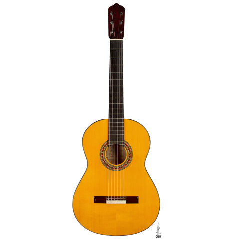 The front of a 2012 Lester DeVoe w/pegs flamenco guitar made of spruce and cypress