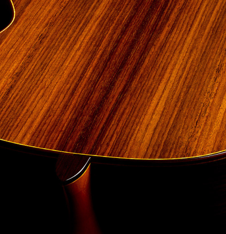 The heel, back binding and purfling of a 2015 Lester DeVoe "Negra" flamenco guitar with pegs made of spruce and Indian rosewood