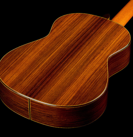 The back and sides of a 2015 Lester DeVoe "Negra" flamenco guitar with pegs made of spruce and Indian rosewood