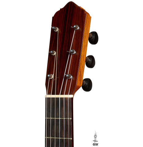 The peghead of a 2015 Lester DeVoe "Negra" flamenco guitar with pegs made of spruce and Indian rosewood