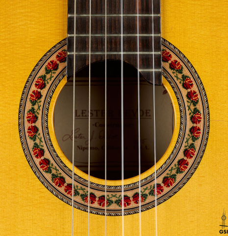 The rosette of a 2015 Lester DeVoe "Negra" flamenco guitar with pegs made of spruce and Indian rosewood