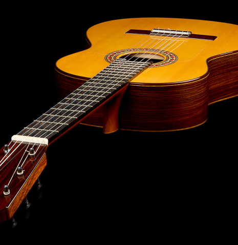 View from the headstock of a 2015 Lester DeVoe "Negra" flamenco guitar with pegs made of spruce and Indian rosewood