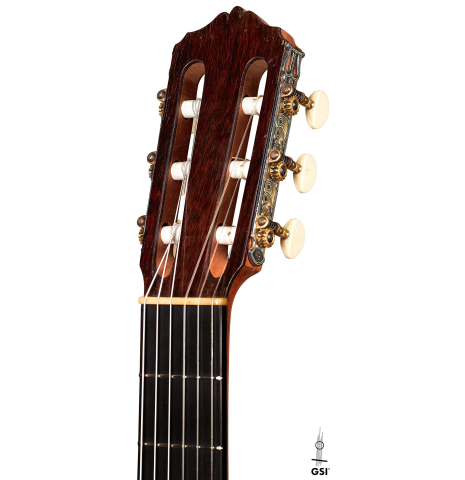 The headstock of a 1927 Domingo Esteso vintage flamenco guitar made of spruce and cypress