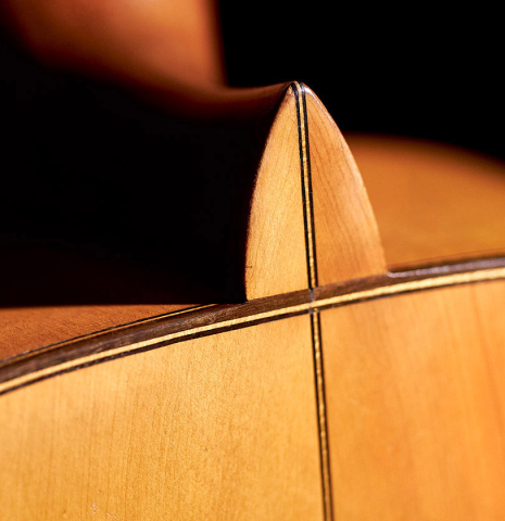 The heel of a 1927 Domingo Esteso vintage flamenco guitar made of spruce and cypress