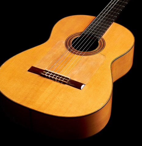The front of a 1927 Domingo Esteso vintage flamenco guitar made of spruce and cypress