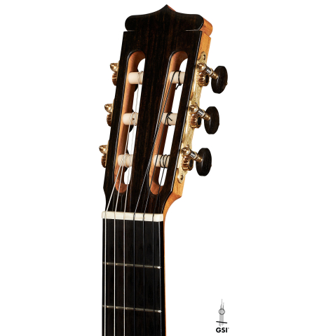 The headstock of a 2023 Paco Fajardo flamenco guitar made of spruce and cypress