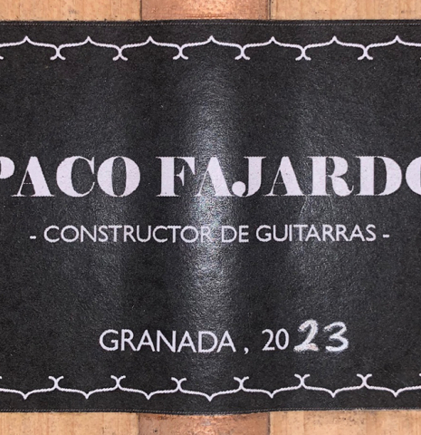 The label of a 2023 Paco Fajardo flamenco guitar made of spruce and cypress