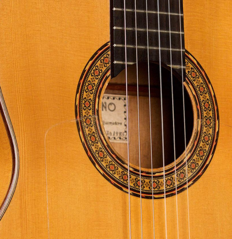The soundboard and rosette of a 1985 Gerundino Fernandez flamenco blanca made of spruce and cypress