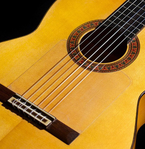 The soundboard of a 1961 Arcangel Fernandez flamenco blanca guitar made of spruce and cypress