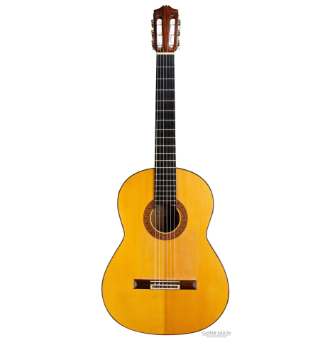 The front of a 1961 Arcangel Fernandez flamenco blanca guitar made of spruce and cypress