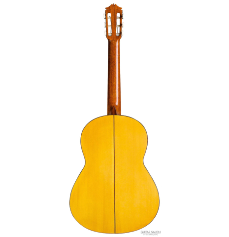 The back of a 1961 Arcangel Fernandez flamenco blanca guitar made of spruce and cypress