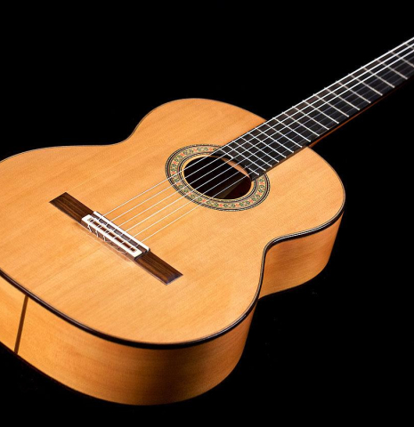 The top and sides of a 2018 Gerundino Fernandez Hijo cedar/cypress "Blanca" flamenco guitar with pegs