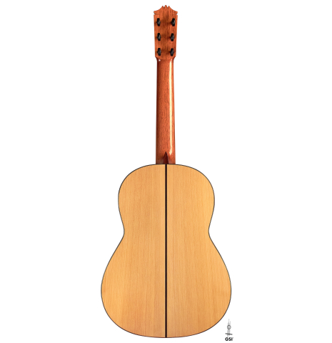 The back of a 1989 Arcangel Fernandez flamenco guitar w/pegs made with spruce and cypress.