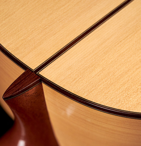 The heel of a 1989 Arcangel Fernandez flamenco guitar w/pegs made with spruce and cypress.
