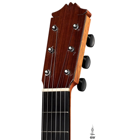 The headstock of a 1989 Arcangel Fernandez flamenco guitar w/pegs made with spruce and cypress.