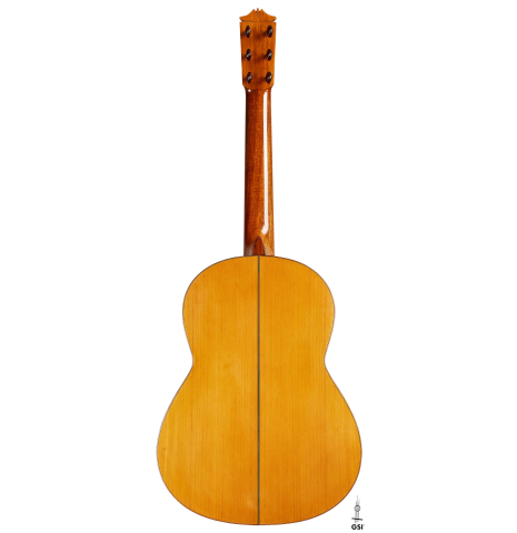 The back of a 1961 Arcangel Fernandez flamenco blanca guitar with pegs made of spruce and cypress.