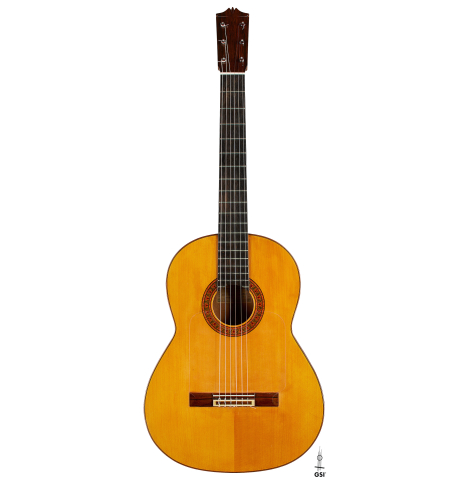 The front of a 1961 Arcangel Fernandez flamenco blanca guitar with pegs made of spruce and cypress.