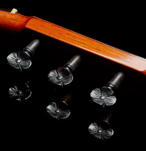 The headstock with carved pegs of a 1971 Jeronimo Pena Fernandez "Flamenco Negra" w/pegs made of spruce and Honduran rosewood