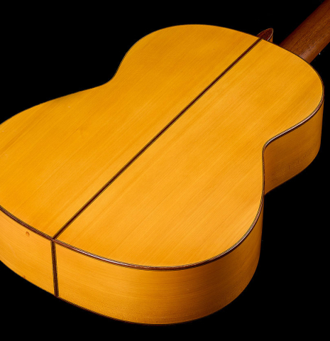 The back and sides of a 1970 Arcangel Fernandez flamenco guitar made of spruce and cypress
