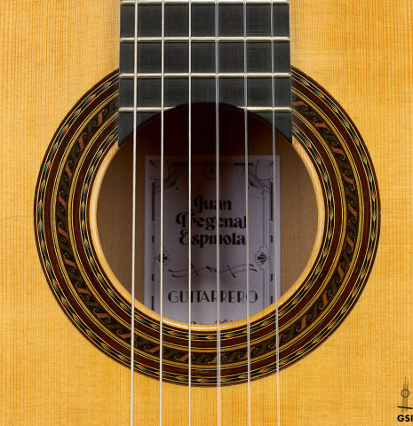 The rosette of a 2025 Juan Fregenal flamenco guitar made of spruce and cypress