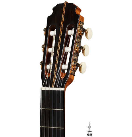 The headstock of a 2025 Darío García "Flamenco Negra" guitar made of spruce and kamagong