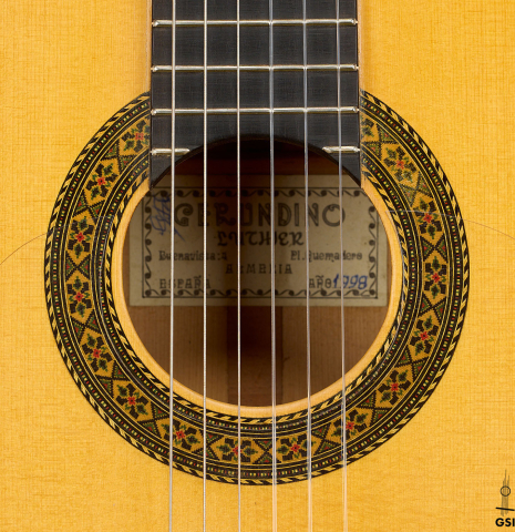 The rosette of a 1998 Gerundino Fernandez flamenco guitar made of spruce and cypress