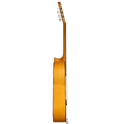 The side of a 1998 Gerundino Fernandez flamenco guitar made of spruce and cypress