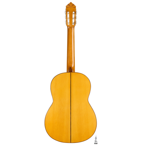 The back of a 1998 Gerundino Fernandez flamenco guitar made of spruce and cypress