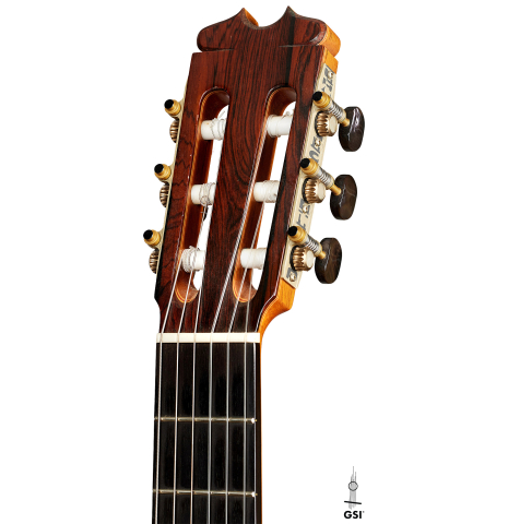 The headstock of a 2006 Conde Hermanos "Felipe V" flamenco negra guitar made of spruce and CSA rosewood