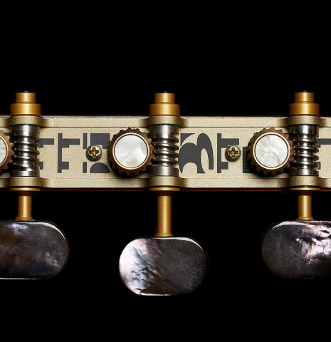 The tuning machines of a 2006 Conde Hermanos "Felipe V" flamenco negra guitar made of spruce and CSA rosewood