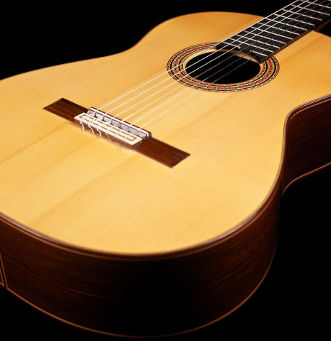 The front of a 2006 Conde Hermanos "AF 25" flamenco guitar made with spruce and Indian rosewood.