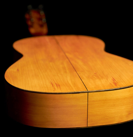 The back and sides of a 1922 Santos Hernandez flamenco guitar with pegs made of spruce and cypress.