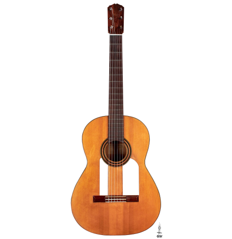 The front of a 1922 Santos Hernandez flamenco guitar with pegs made of spruce and cypress.
